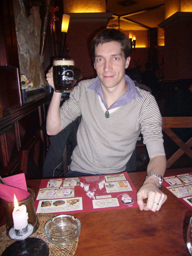 Tim with a Velkopopovický Kozel beer in the restaurant Svatého Václava