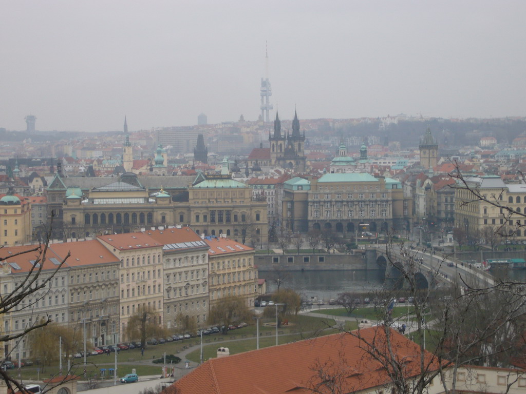 View from the Old Castle Stairs on the Mánes Bridge and the city center, with the church of Our Lady before Týn, the tower of the Old Town Hall, the Powder Gate and the ikov Television Tower