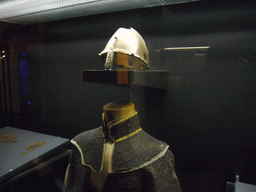 Helmet and armour inside the Story of Prague Castle museum, in the Old Royal Palace