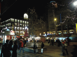 Wanceslas Square, with a shopping center and a christmas tree, by night