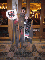 Miaomiao with an actor dressed up like St. Wenceslas, in front of the restaurant Svatého Václava