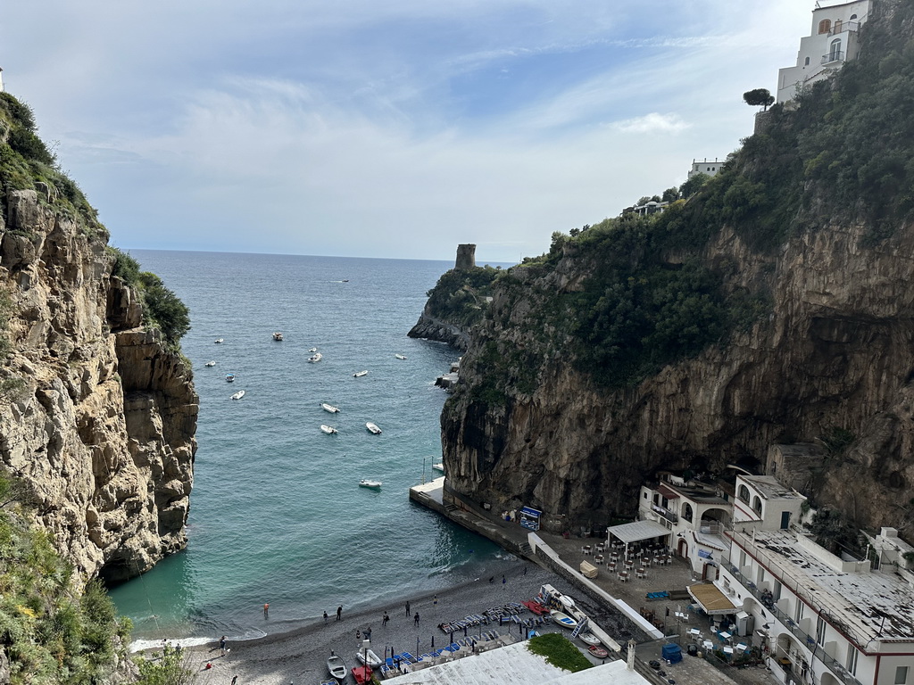 The Marina di Praia beach, the Torre Asciola tower and the Tyrrhenian Sea, viewed from a parking lot next to the Amalfi Drive