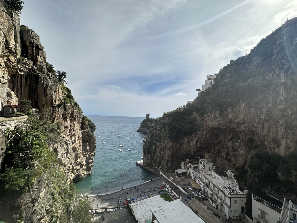 The Marina di Praia beach, the Torre Asciola tower and the Tyrrhenian Sea, viewed from a parking lot next to the Amalfi Drive