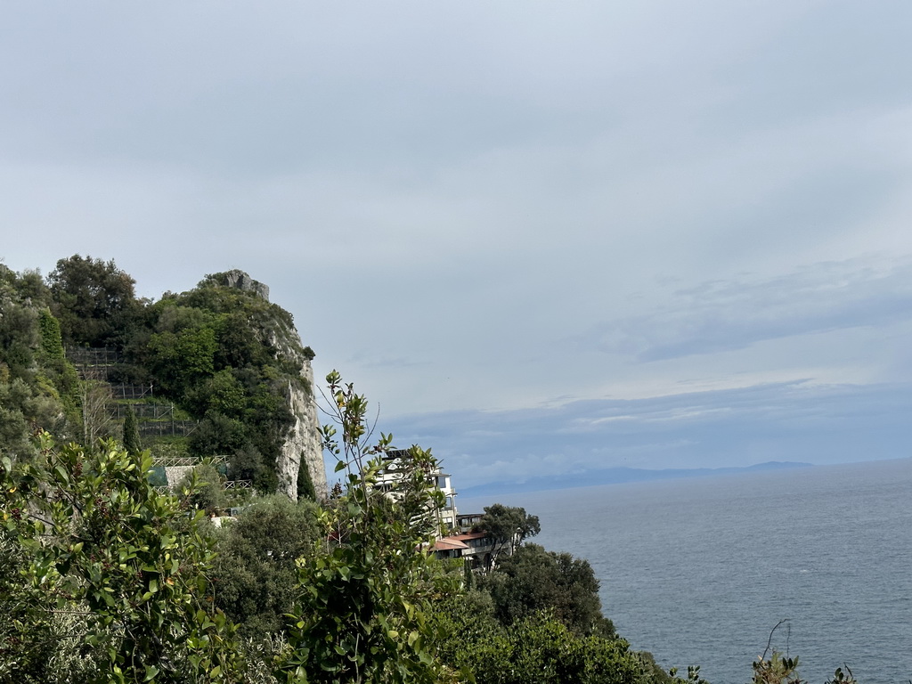 Houses at the east side of town and the Tyrrhenian Sea, viewed from the parking lot of the Alleré Art Shop Café at the Via Smeraldo road