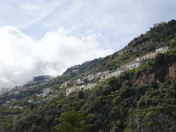 Houses at the east side of town, viewed from the parking lot of the Alleré Art Shop Café at the Via Smeraldo road