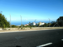 Houses at the south side of the town of El Tanque, viewed from the rental car on the TF-82 road