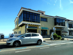 Buildings at the Avenida Príncipes de España street in the town center of El Tanque, viewed from the rental car