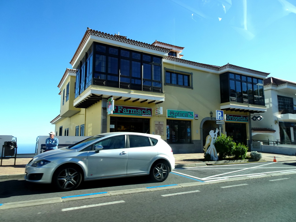 Buildings at the Avenida Príncipes de España street in the town center of El Tanque, viewed from the rental car