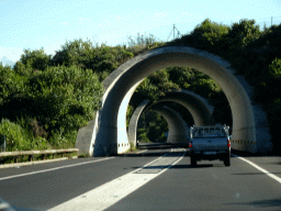 Three tunnels at the TF-5 road just south of the town of Genovés, viewed from the rental car
