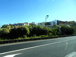 Houses at the west side of the town of Los Realejos, viewed from the rental car on the TF-5 road