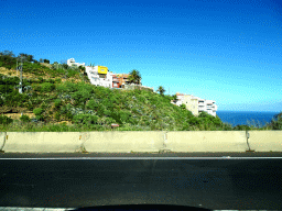Houses at the west side of the town of Los Realejos, viewed from the rental car on the TF-5 road