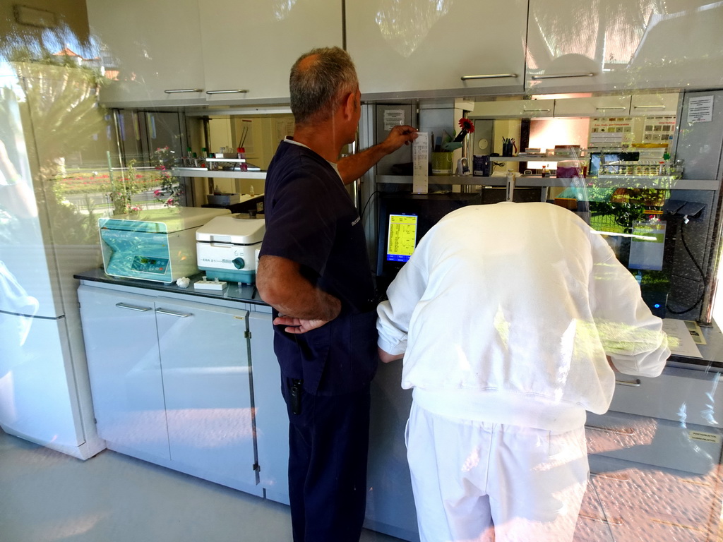 People working in the Laboratory at the Animal Embassy at the Loro Parque zoo, during the Discovery Tour