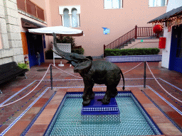 Max and an Elephant statue at the Gambian Market at the Loro Parque zoo