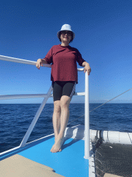 Miaomiao on the deck of the Sagitarius Cat boat