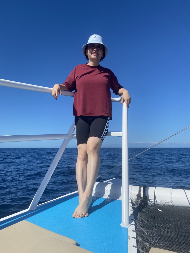 Miaomiao on the deck of the Sagitarius Cat boat