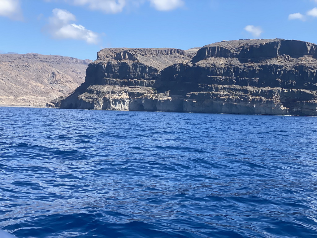 Caves at the coastline, viewed from a small boat from the jet ski to the Sagitarius Cat boat