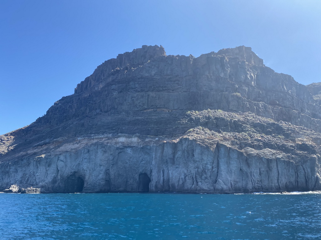 Caves at the coastline, viewed from the Sagitarius Cat boat