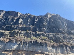 Rocks at the coastline, viewed from the Sagitarius Cat boat