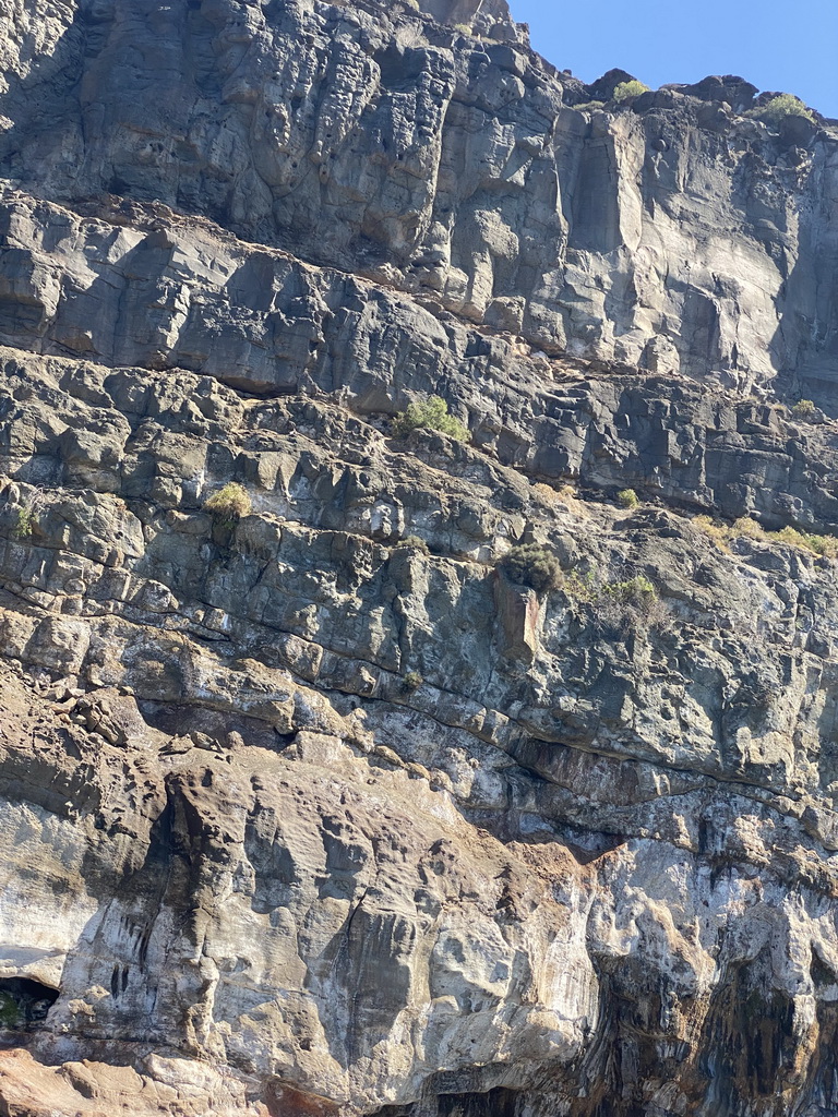 Rocks at the coastline, viewed from the Sagitarius Cat boat