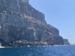 Rocks at the coastline, viewed from the Sagitarius Cat boat