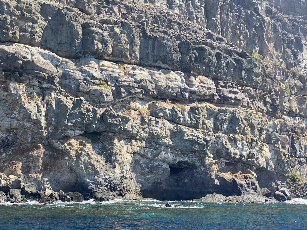 Cave at the coastline, viewed from the Sagitarius Cat boat