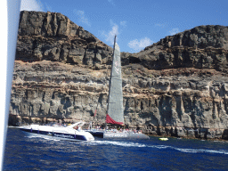 Boats in front of the coastline, viewed from the Sagitarius Cat boat