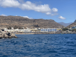 The Playa Puerto De Mogan beach, viewed from the Sagitarius Cat boat