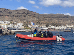 Boat in front of the Hotel THe Puerto de Mogán and the Playa Puerto De Mogan beach, viewed from the Sagitarius Cat boat