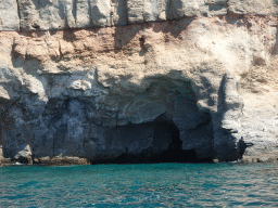 Cave at the coastline on the east side of the town, viewed from the Sagitarius Cat boat