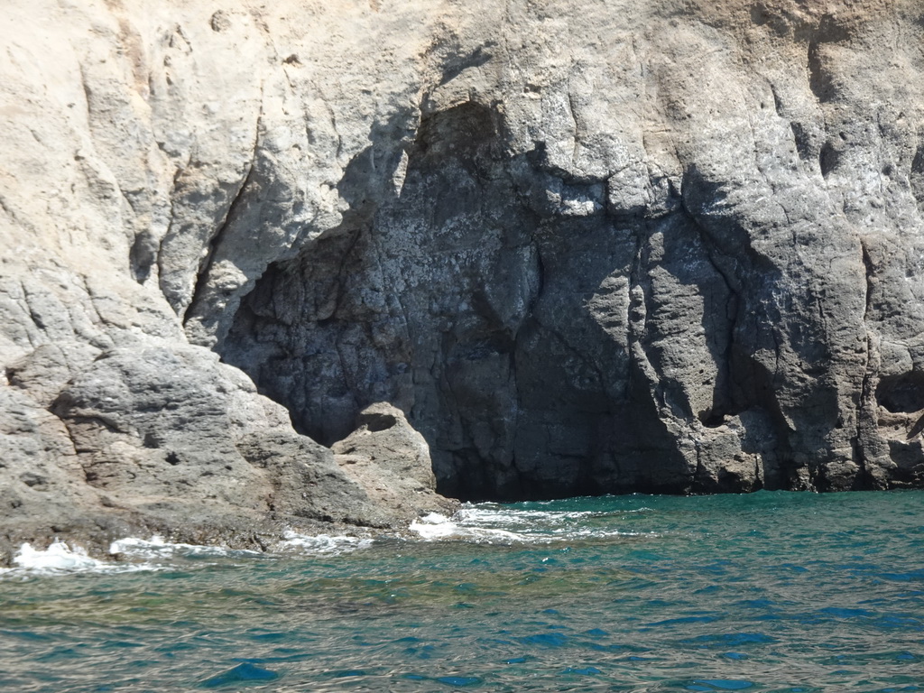 Cave at the coastline on the east side of the town, viewed from the Sagitarius Cat boat