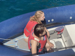 Miaomiao in the small boat from the Sagitarius Cat boat to the parasail, viewed from the Sagitarius Cat boat