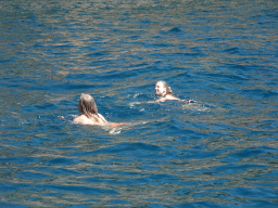 People swimming in front of the coastline just east of the town, viewed from the Sagitarius Cat boat