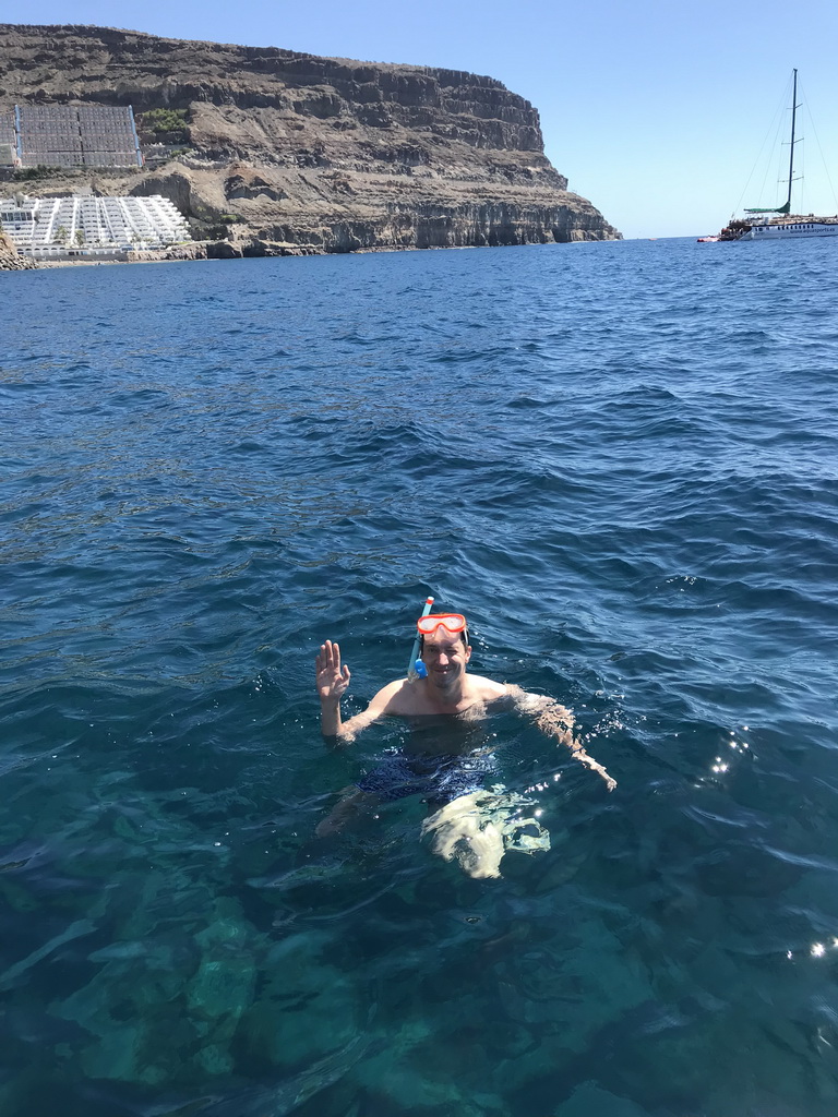 Tim snorkeling in front of the coastline just east of the town, viewed from the Sagitarius Cat boat