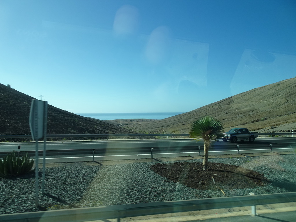 Fields at the Cañada de Corral Blanco ravine, viewed from the tour bus bus from Maspalomas on the GC-1 road