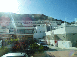 Houses at the Avenida Tomás Roca Bosch street, viewed from the tour bus bus from Maspalomas