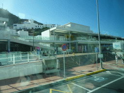 Front of the Market Puerto Rico at the Avenida Tomás Roca Bosch street, viewed from the tour bus bus from Maspalomas