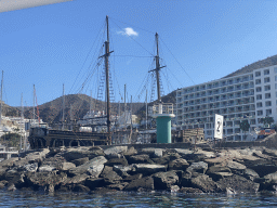 Old ship in the harbour, viewed from the Sagitarius Cat boat