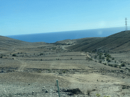 Fields at the Cañada de Corral Blanco ravine, viewed from the tour bus to Maspalomas on the GC-1 road