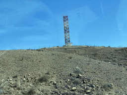 Tower near the Barranco del Pocillo ravine, viewed from the tour bus to Maspalomas on the GC-1 road