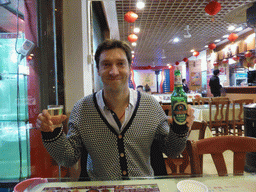 Tim with Tsingtao beer at our dinner restaurant at the crossing of Hubei Road and Henan Road