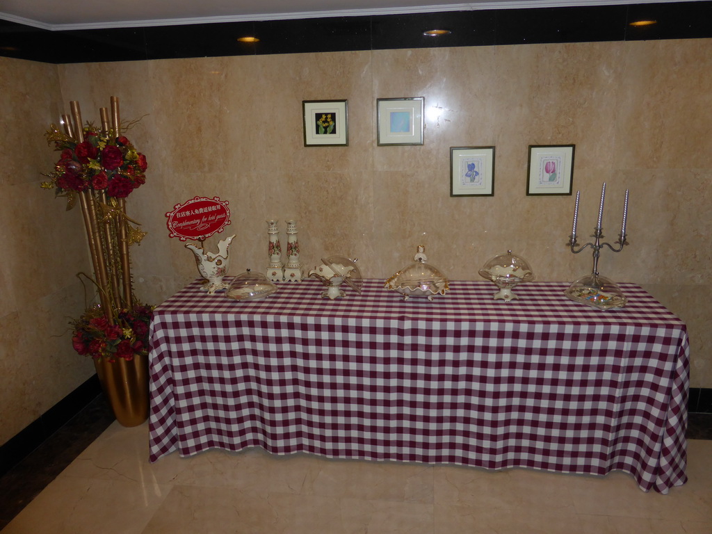 Table with candies in a hallway of the Oceanwide Elite Hotel