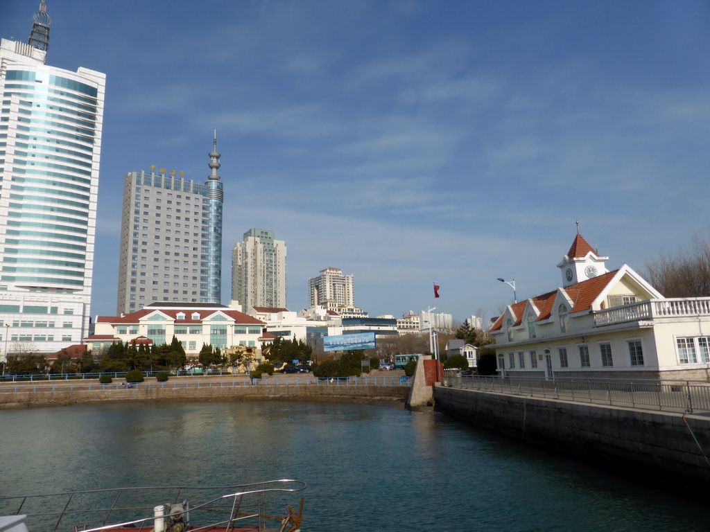 The Feiyang Yacht Warf and skyscrapers at the west side of the city