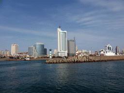 Pier at the Feiyang Yacht Warf and skyscrapers at the west side of the city, viewed from the tour boat