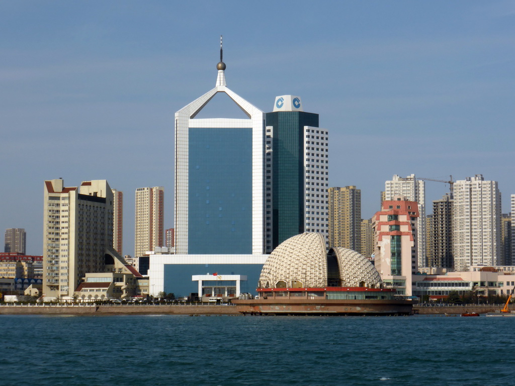 Qingdao Bay and skyscrapers and dome at the west side of the city, viewed from the tour boat