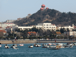 Boats in Qingdao Bay and the Xinhaoshan Park, viewed from the tour boat