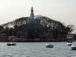 Xiao Qingdao island with its lighthouse in Qingdao Bay, viewed from the tour boat