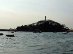 Xiao Qingdao island with its lighthouse in Qingdao Bay, viewed from the tour boat