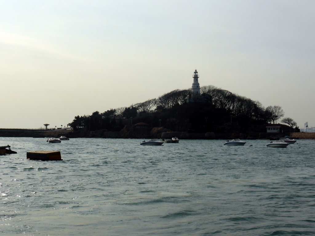 Xiao Qingdao island with its lighthouse in Qingdao Bay, viewed from the tour boat