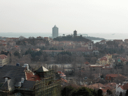 Xiaoyushan Park with its pagodas and surroundings, and the Qingdao Site Museum of the Former German Governor`s Residence, under renovation, viewed from the viewing point at the Xinhaoshan Park