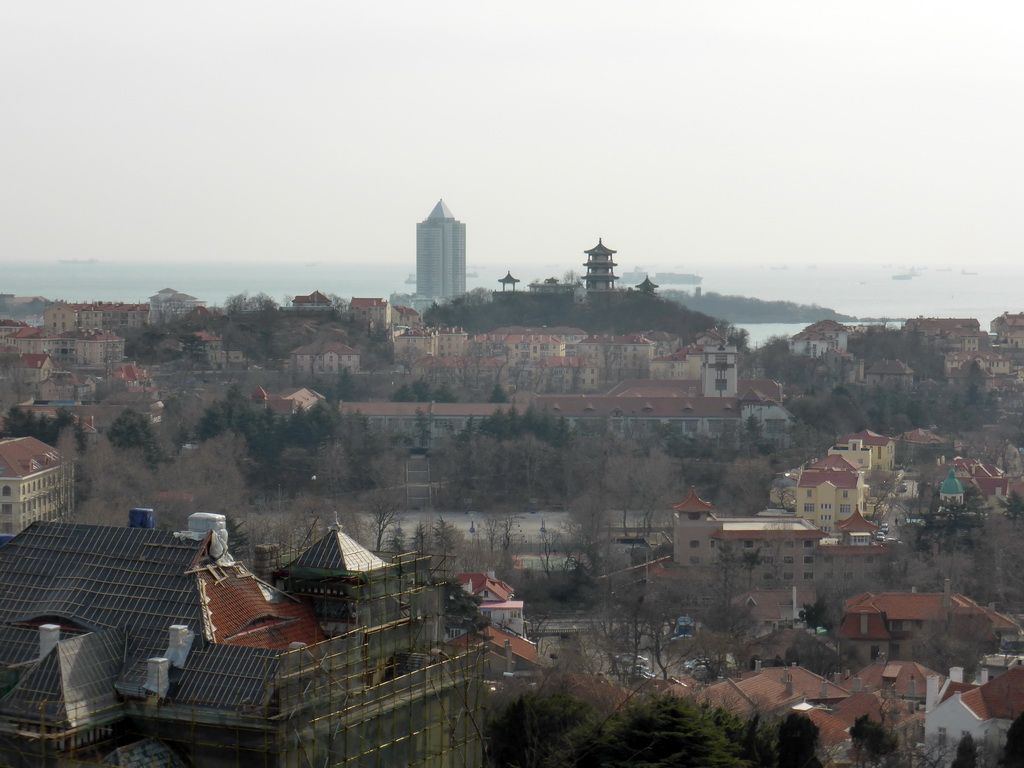 Xiaoyushan Park with its pagodas and surroundings, and the Qingdao Site Museum of the Former German Governor`s Residence, under renovation, viewed from the viewing point at the Xinhaoshan Park